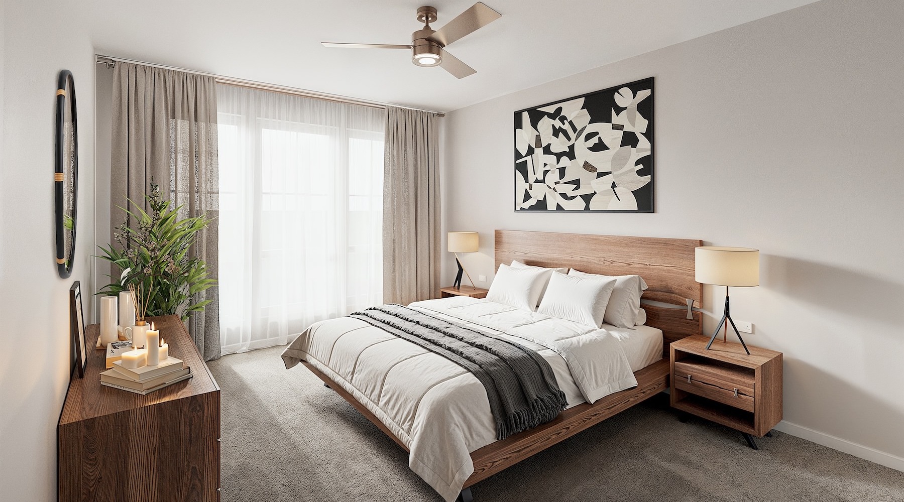 a bed in a room with a large window and a desk