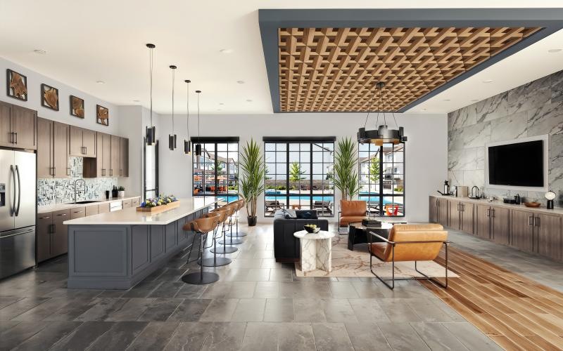 a kitchen with a bar and chairs