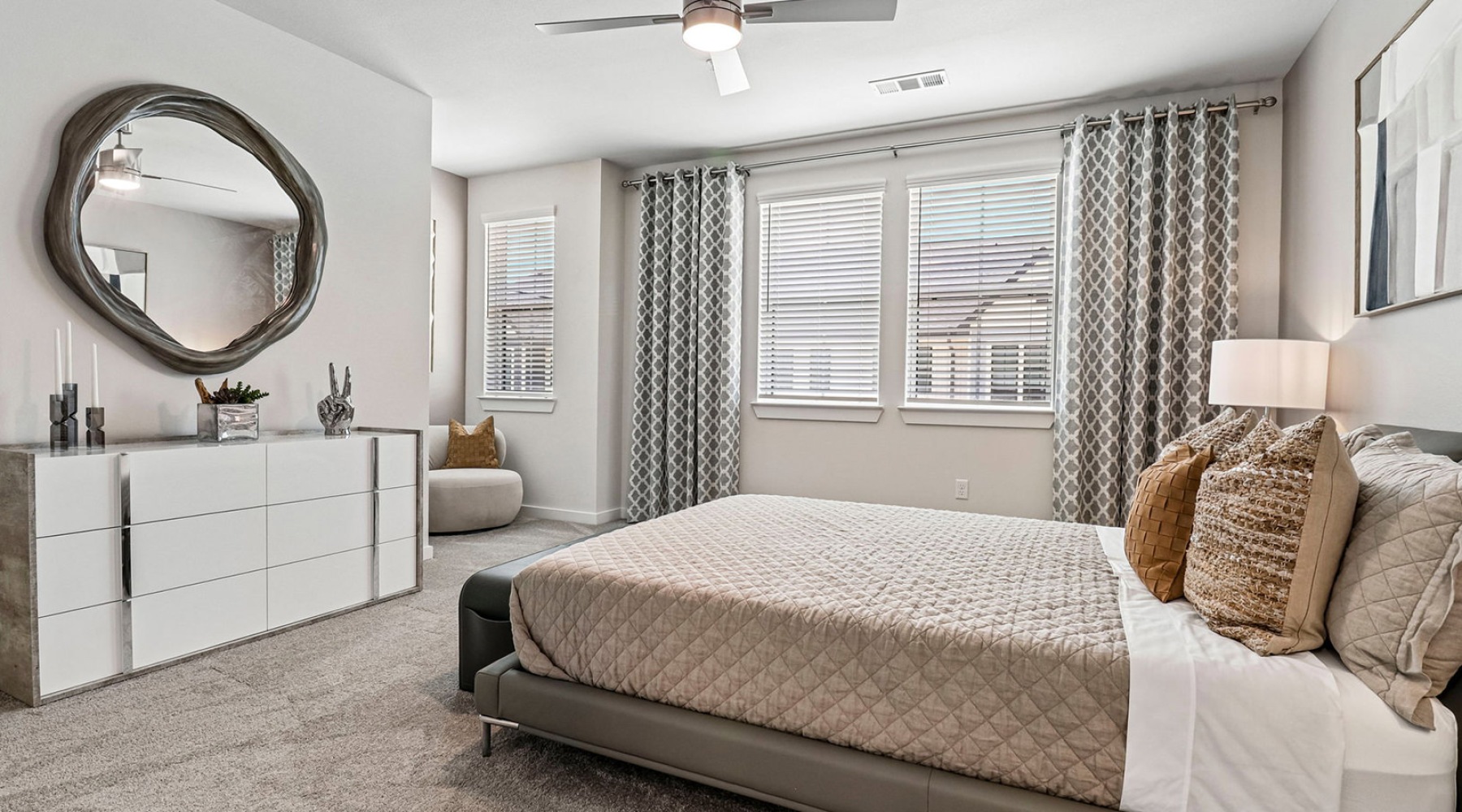 bedroom with bed dresser with mirror