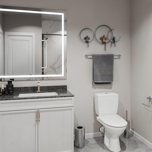 a bathroom with a toilet and sink